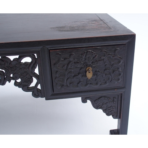 818 - A pair of Chinese hardwood low tables