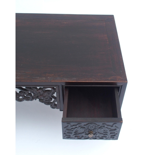 818 - A pair of Chinese hardwood low tables