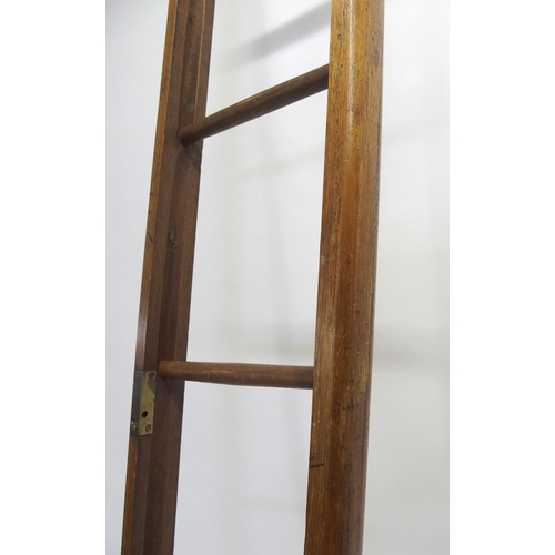 830 - A 19th Century mahogany library pole ladder