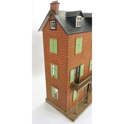 832 - An Edwardian four storey doll's house