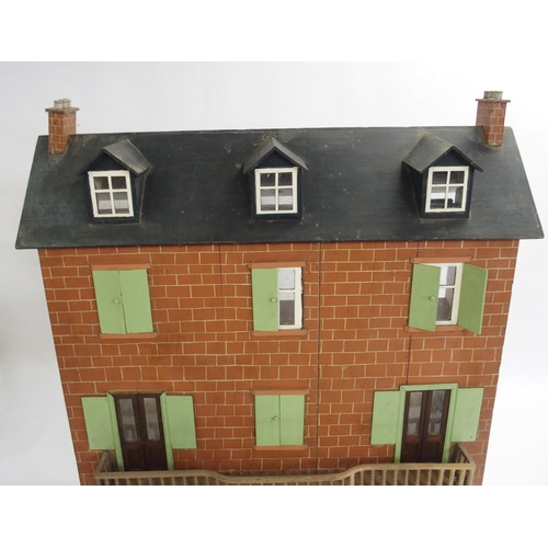 832 - An Edwardian four storey doll's house