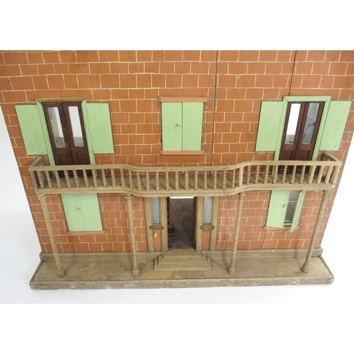 832 - An Edwardian four storey doll's house