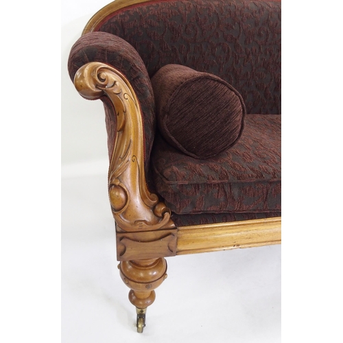 834 - A Victorian mahogany framed curved back settee