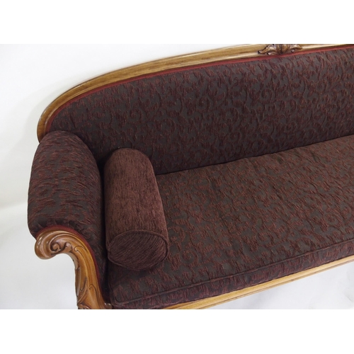 834 - A Victorian mahogany framed curved back settee