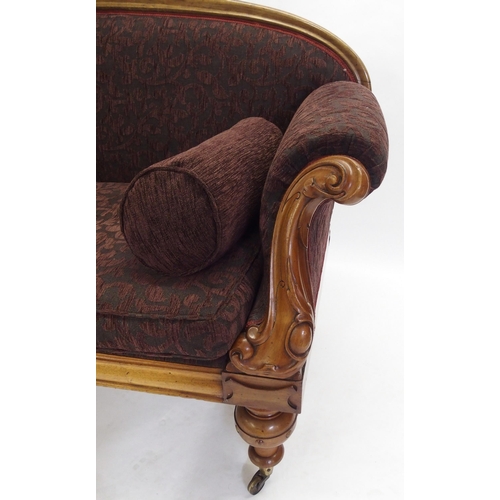 834 - A Victorian mahogany framed curved back settee