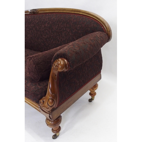 834 - A Victorian mahogany framed curved back settee