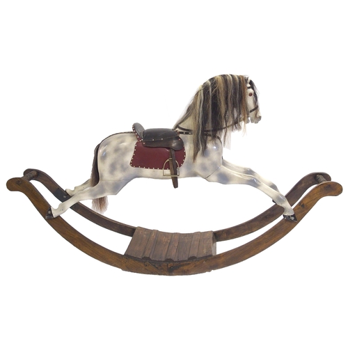 835 - A painted pine rocking horse