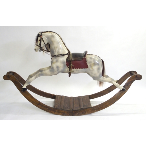 835 - A painted pine rocking horse