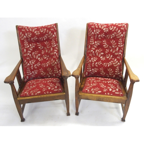 836 - A pair of Liberty style upholstered armchairs