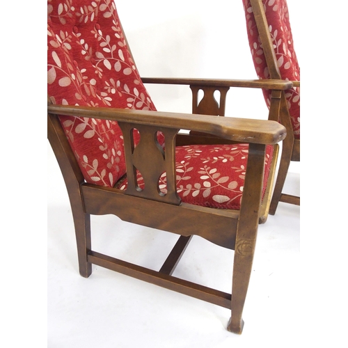 836 - A pair of Liberty style upholstered armchairs