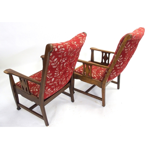 836 - A pair of Liberty style upholstered armchairs