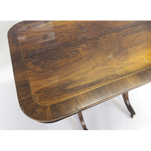 837 - A George IV rosewood fold over rectangular table