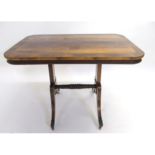 837 - A George IV rosewood fold over rectangular table