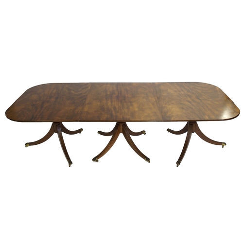 838 - A mahogany triple pillar D-end dining table