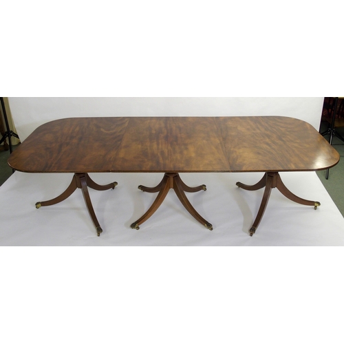 838 - A mahogany triple pillar D-end dining table