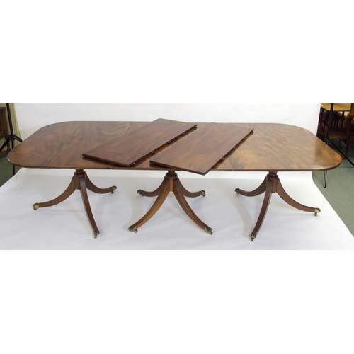 838 - A mahogany triple pillar D-end dining table