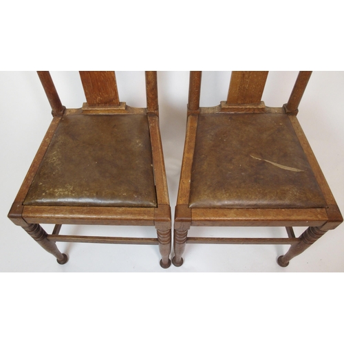 839 - A set of twelve oak Arts and Crafts dining chairs