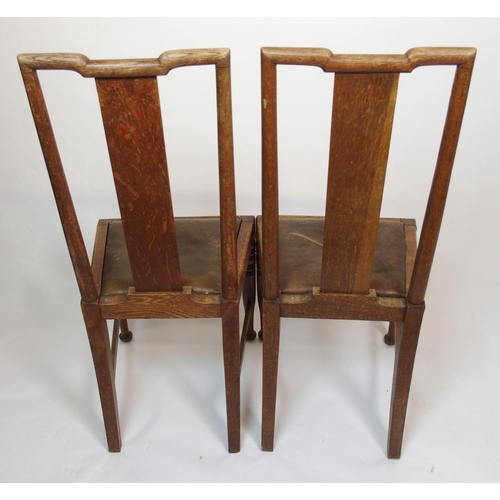 839 - A set of twelve oak Arts and Crafts dining chairs