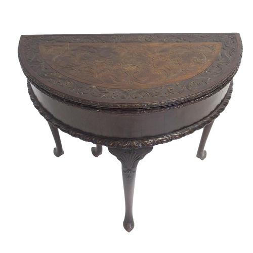 841 - A mahogany D-shaped fold over tea table