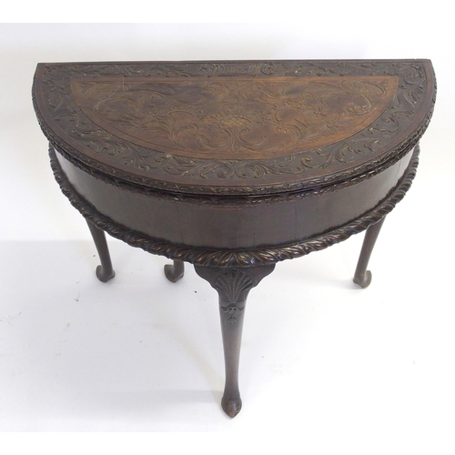 841 - A mahogany D-shaped fold over tea table