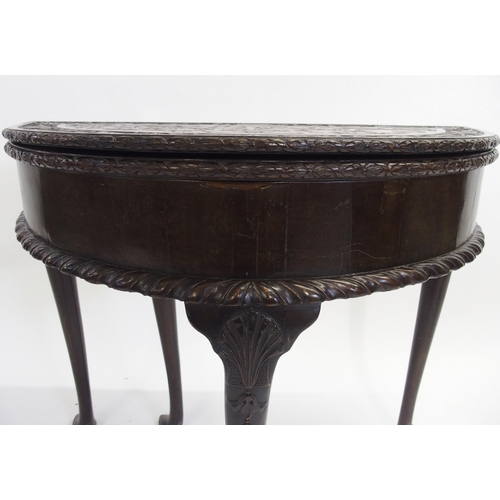 841 - A mahogany D-shaped fold over tea table