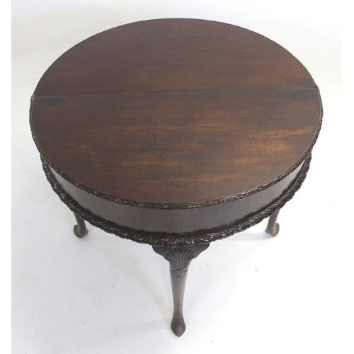 841 - A mahogany D-shaped fold over tea table