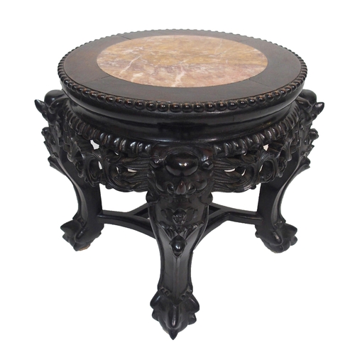 842 - A Chinese hardwood circular pedestal