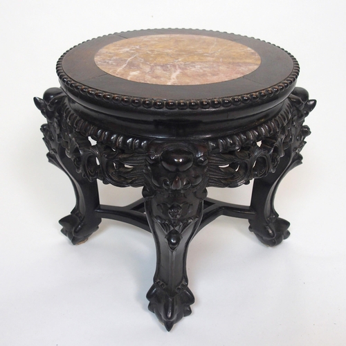 842 - A Chinese hardwood circular pedestal