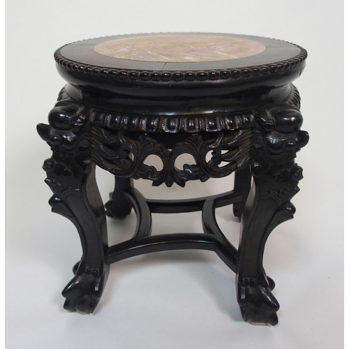 842 - A Chinese hardwood circular pedestal