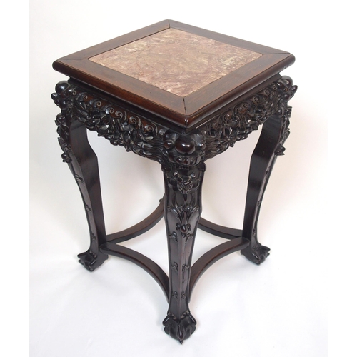 843 - A Chinese hardwood square pedestal