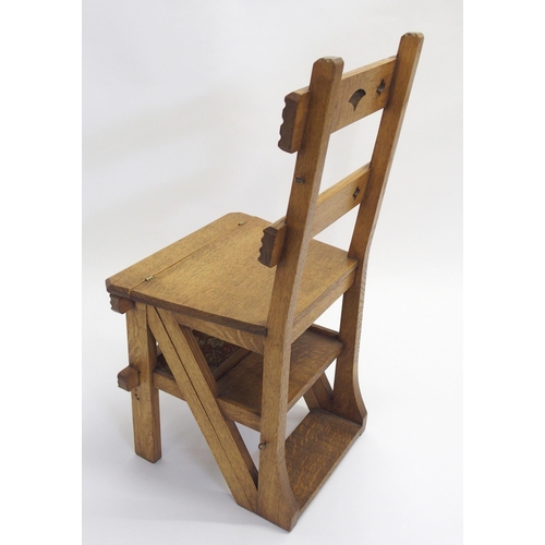 846 - A Victorian oak Gothic style library step chair