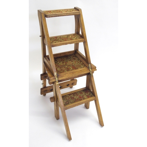 846 - A Victorian oak Gothic style library step chair