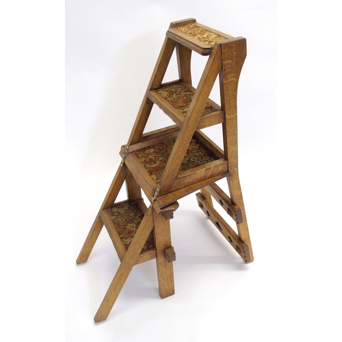 846 - A Victorian oak Gothic style library step chair