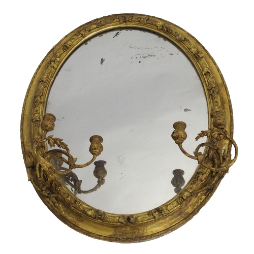 848 - A Victorian giltwood and gesso oval wall mirror