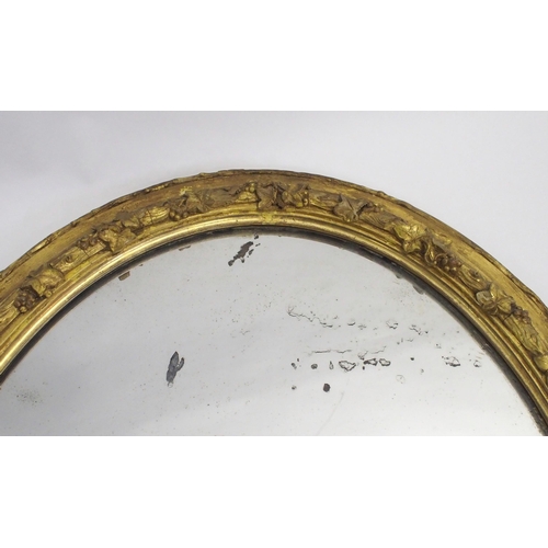 848 - A Victorian giltwood and gesso oval wall mirror