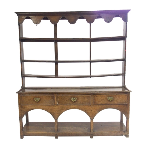 849 - An oak dresser and rack