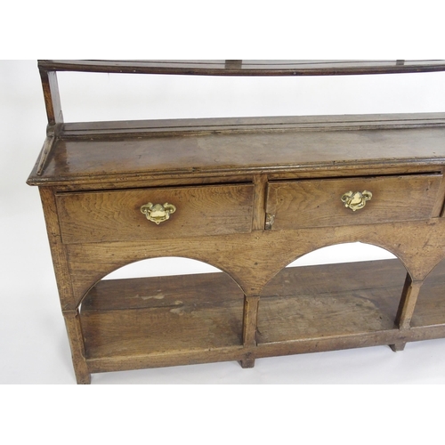 849 - An oak dresser and rack