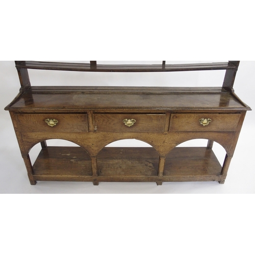 849 - An oak dresser and rack