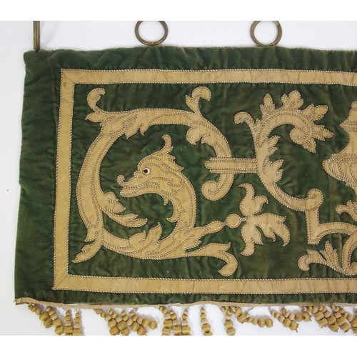 850 - A green ground silk and velvet rectangular banner