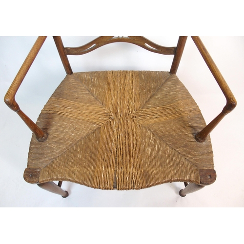 851 - A Morris style ash armchair