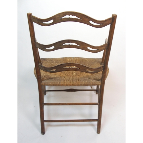 851 - A Morris style ash armchair