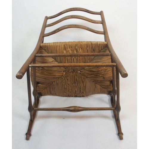 851 - A Morris style ash armchair