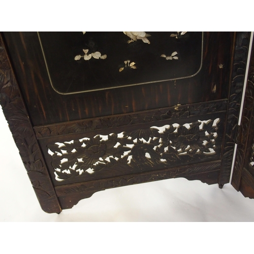 854 - A Japanese two-fold ebonised draught screen