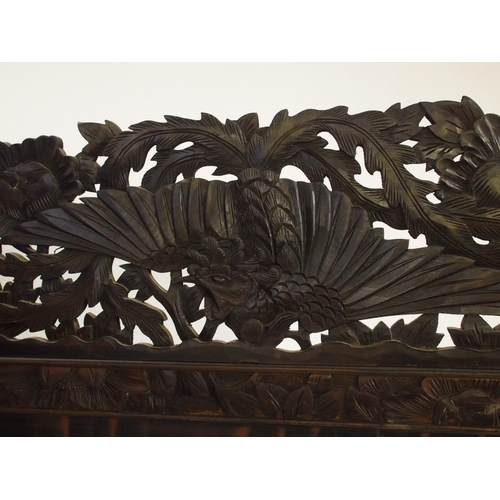 854 - A Japanese two-fold ebonised draught screen