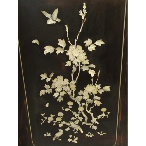 854 - A Japanese two-fold ebonised draught screen