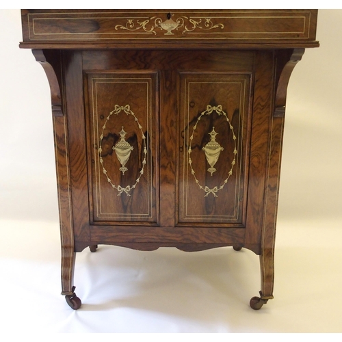 859 - A Victorian rosewood Davenport