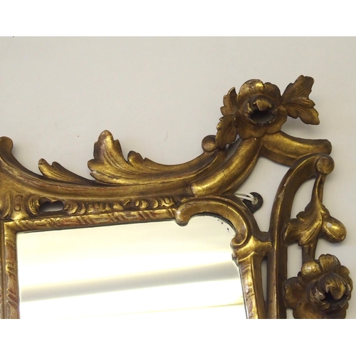 861 - A Chippendale style giltwood triple plate wall mirror