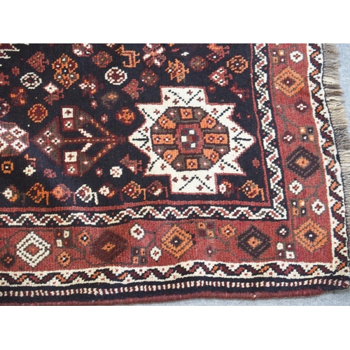 865 - A Persian Qashqai tribal rug