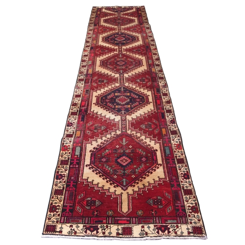 870 - A red ground Azerbaijan runner