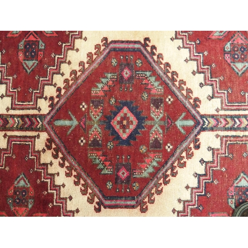 870 - A red ground Azerbaijan runner